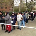 A line waiting for food and water at Grand and Clinton on the Lower East Side. 